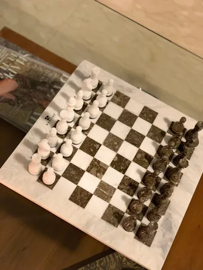 Royal Bishop marble chess set on coffee table customer photo
