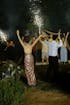 Halter Neck Metallic Sequin Evening Gown with Draped Waist Design