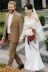 Minimalist Off-Shoulder Satin Wedding Gown with Detachable Sleeves and Elegant Train