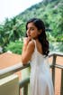 Minimalist Off-Shoulder Satin Wedding Gown with Detachable Sleeves and Elegant Train