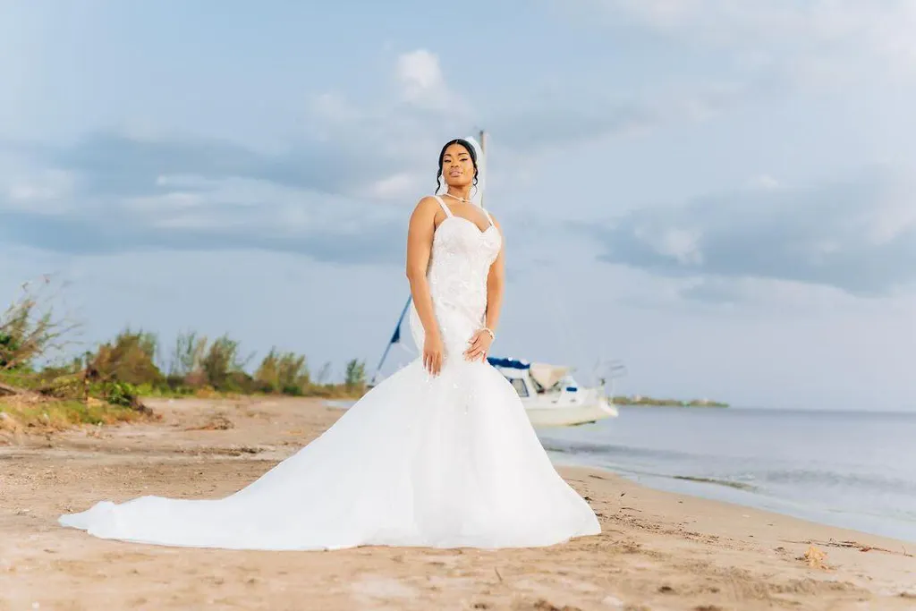 Mermaid Ivory Spaghetti Straps Lace Sweep Train Wedding Dress