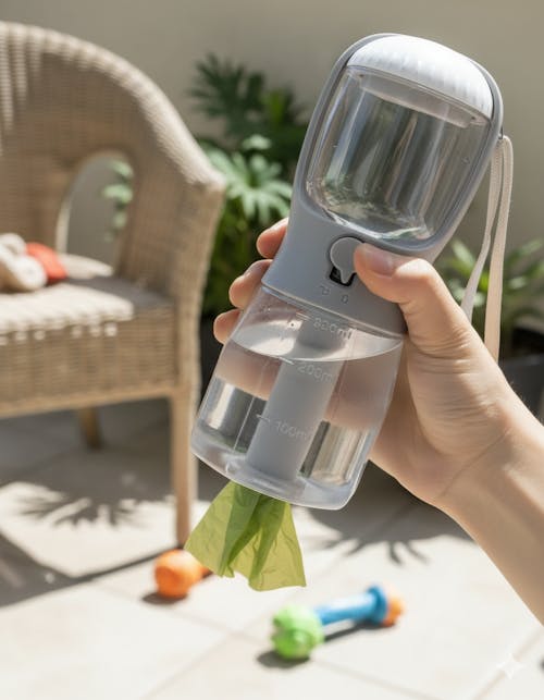 Adventure‑Ready 3‑in‑1 Pet Travel Bottle — Clean Water, Food & Waste Bags