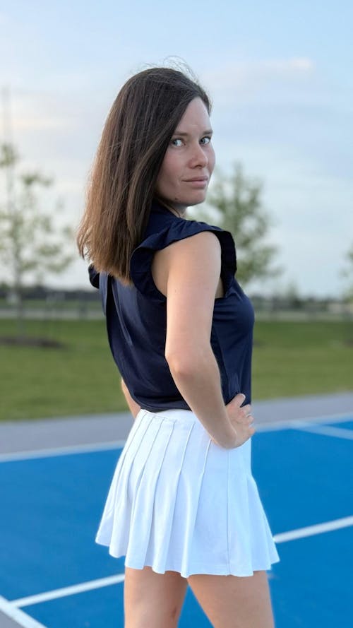 Button-Placket Ruffled Sleeveless Polo Shirt for Women