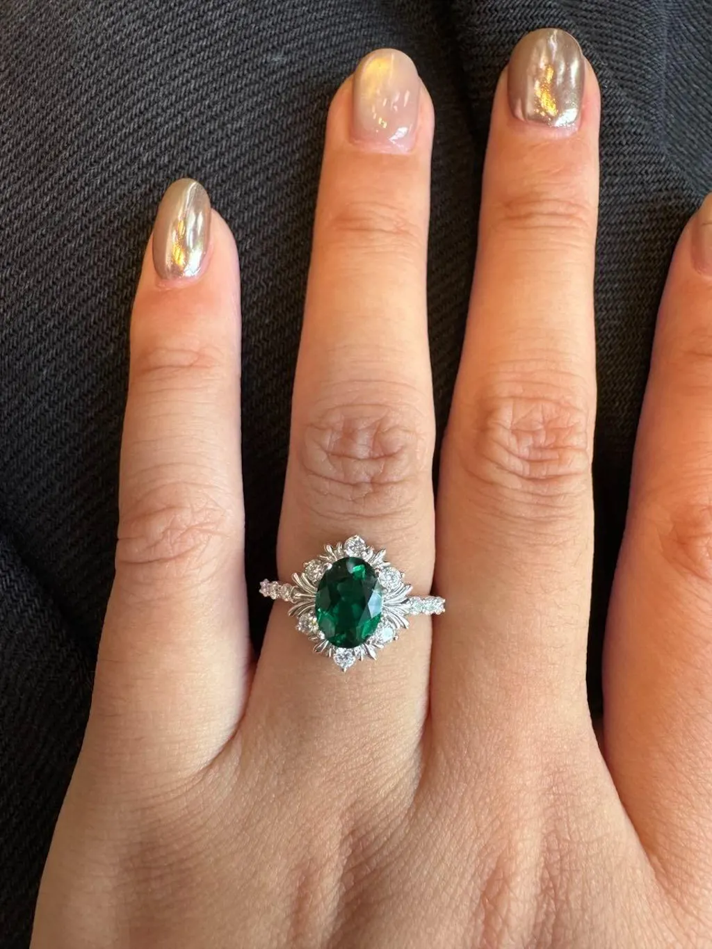 Enshrined Glow | Vintage Oval Cut Emerald Halo Engagement Ring