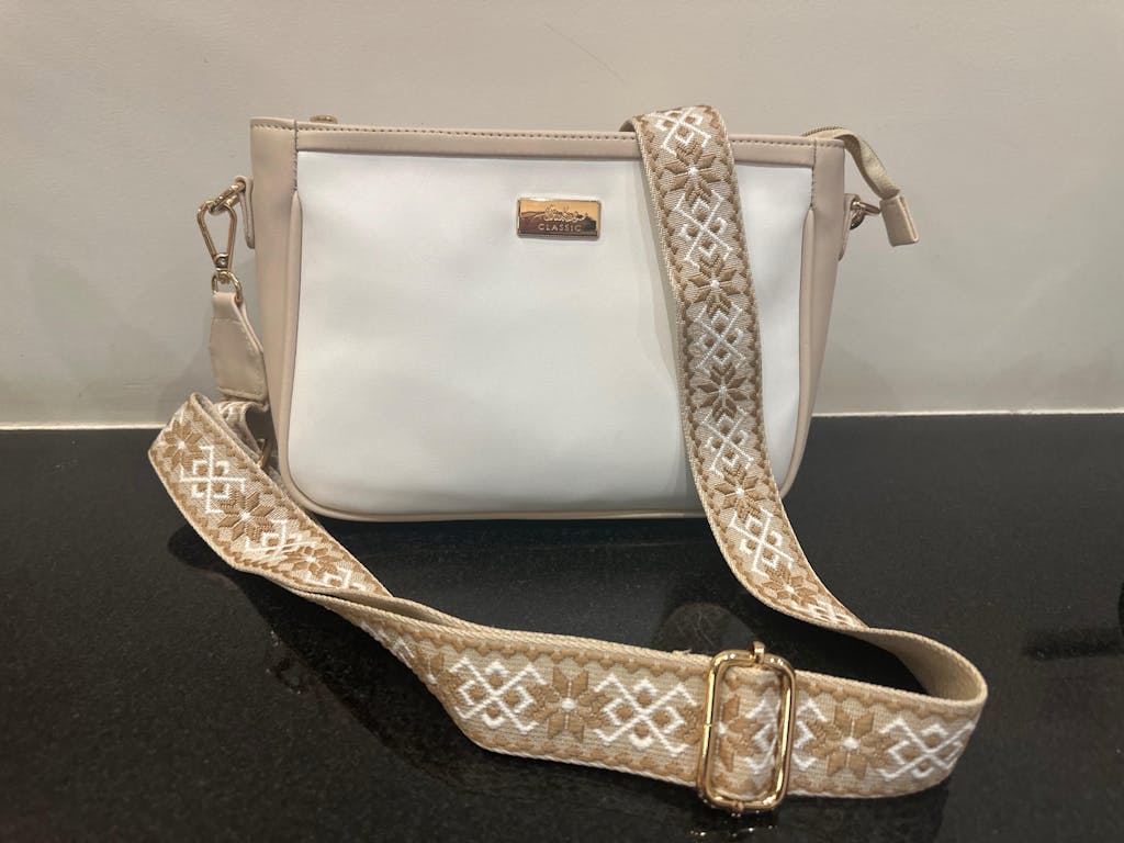 Ivory Lustre Sling bag