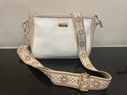 Ivory Lustre Sling bag