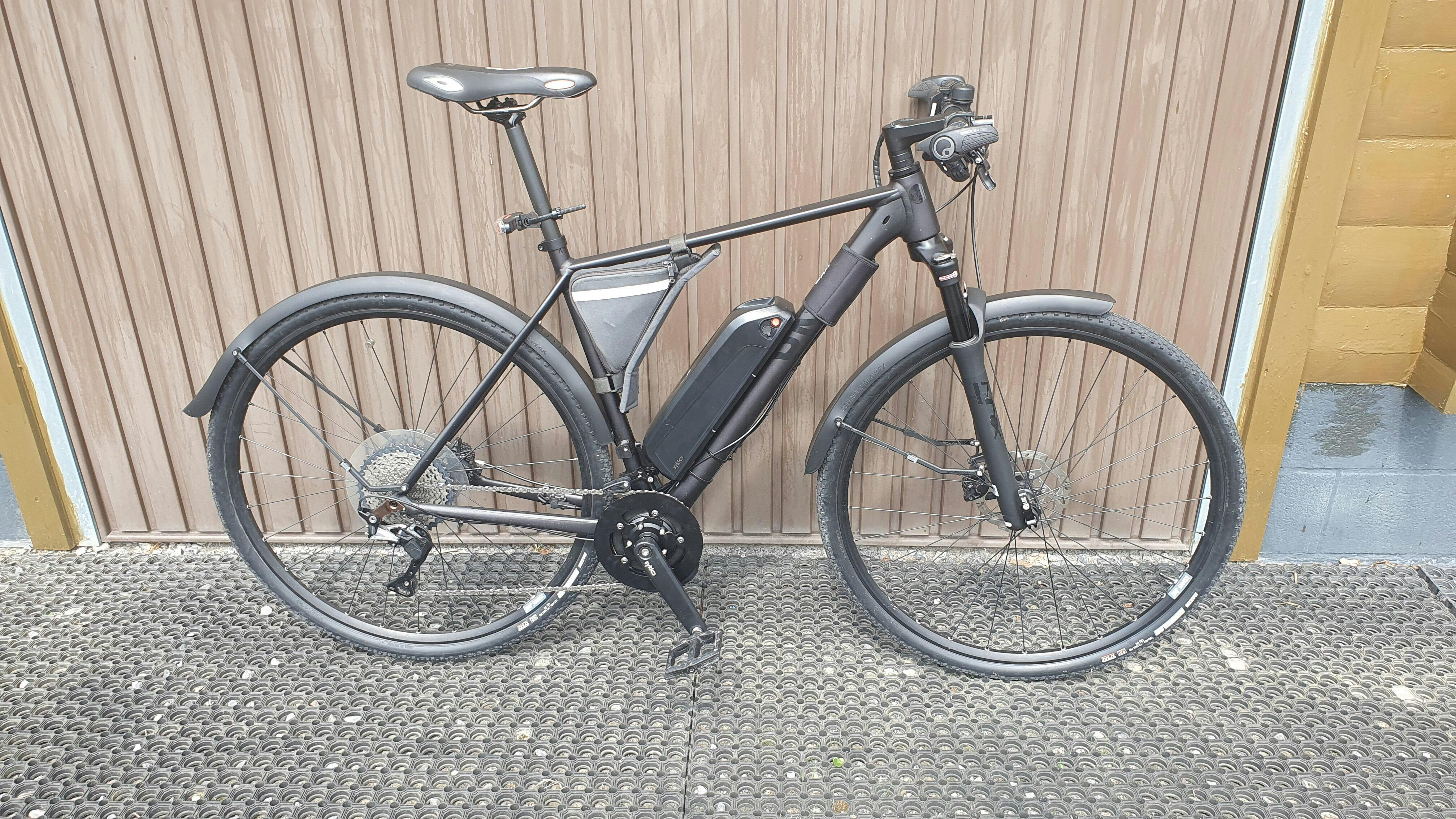 Electrified Peugeot VTC with TSDZ2 motor and 250 Wh bottle battery