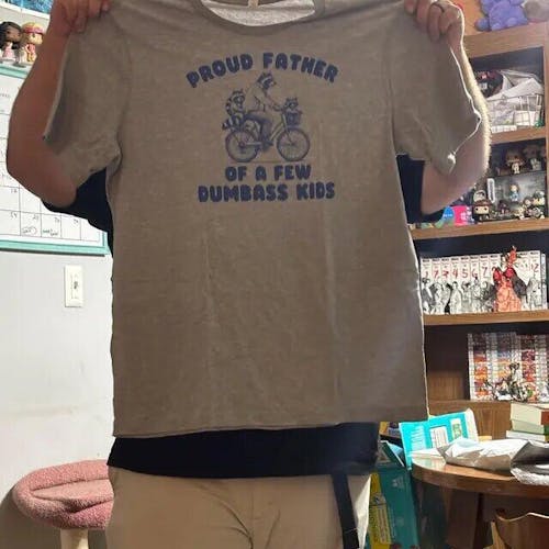 PROUD FATHER OF A FEW D*MBASS KIDS