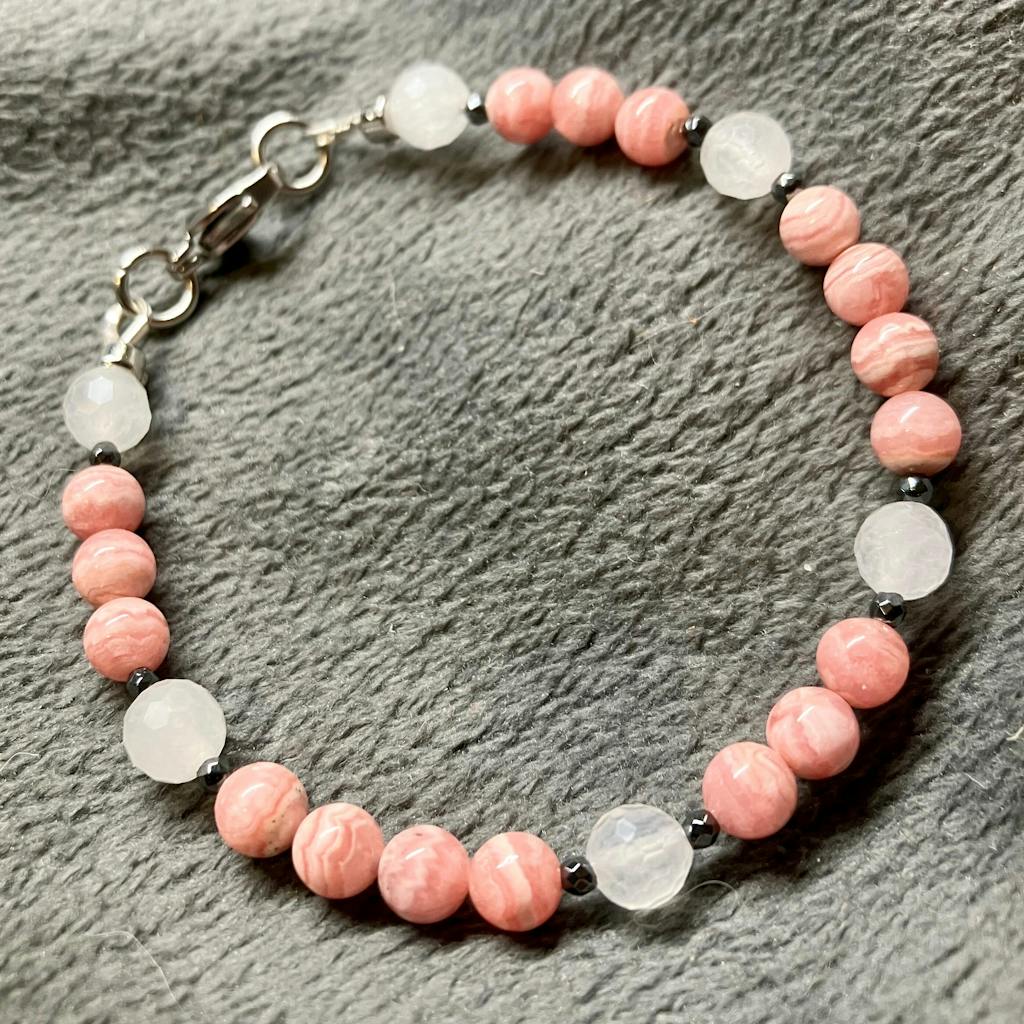 Rhodochrosite A+ · Smooth · Round · 5mm, 6mm