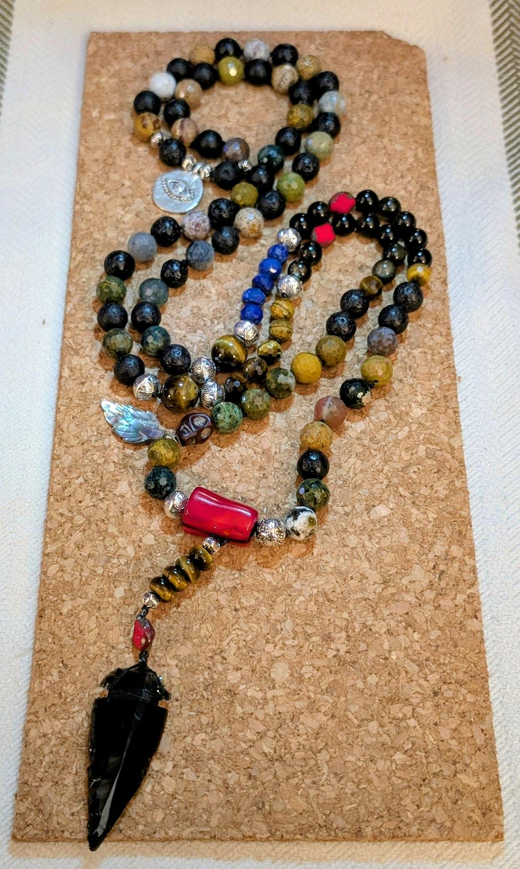 Kambaby Ocean Jasper · Faceted · Round ·  6mm, 8mm, 10mm