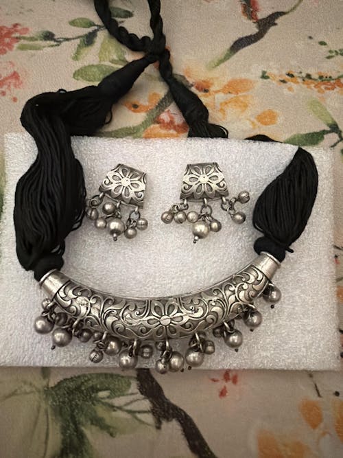 Tela Naari Chhitra Silver-Plated Black Tassel Necklace Set