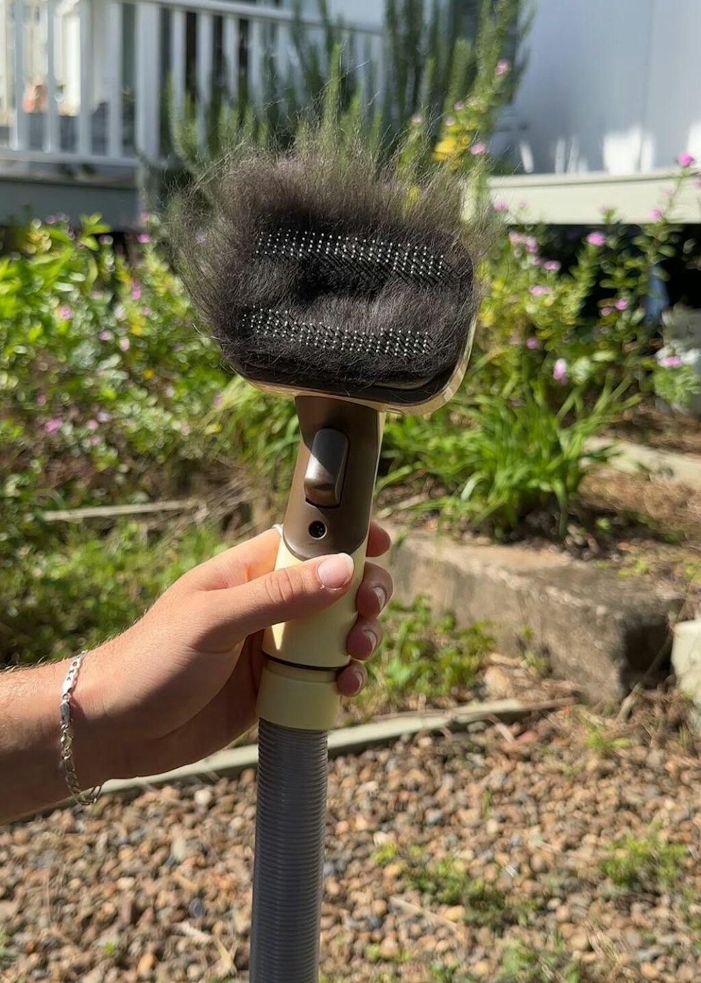 GROOMI™ 3-In-1 Vacuum Pet Brush