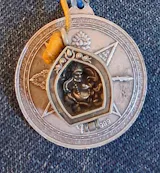 Tiny Dzambhala Ghau Pendant | Metal and Glass | Approx 3/4in x 1/2in | Tibet | Gau