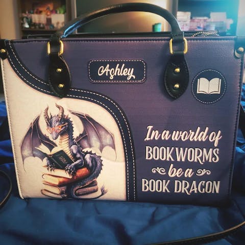 In A World Of Bookworms Be A Book Dragon DNRZ1702004A Leather Bag