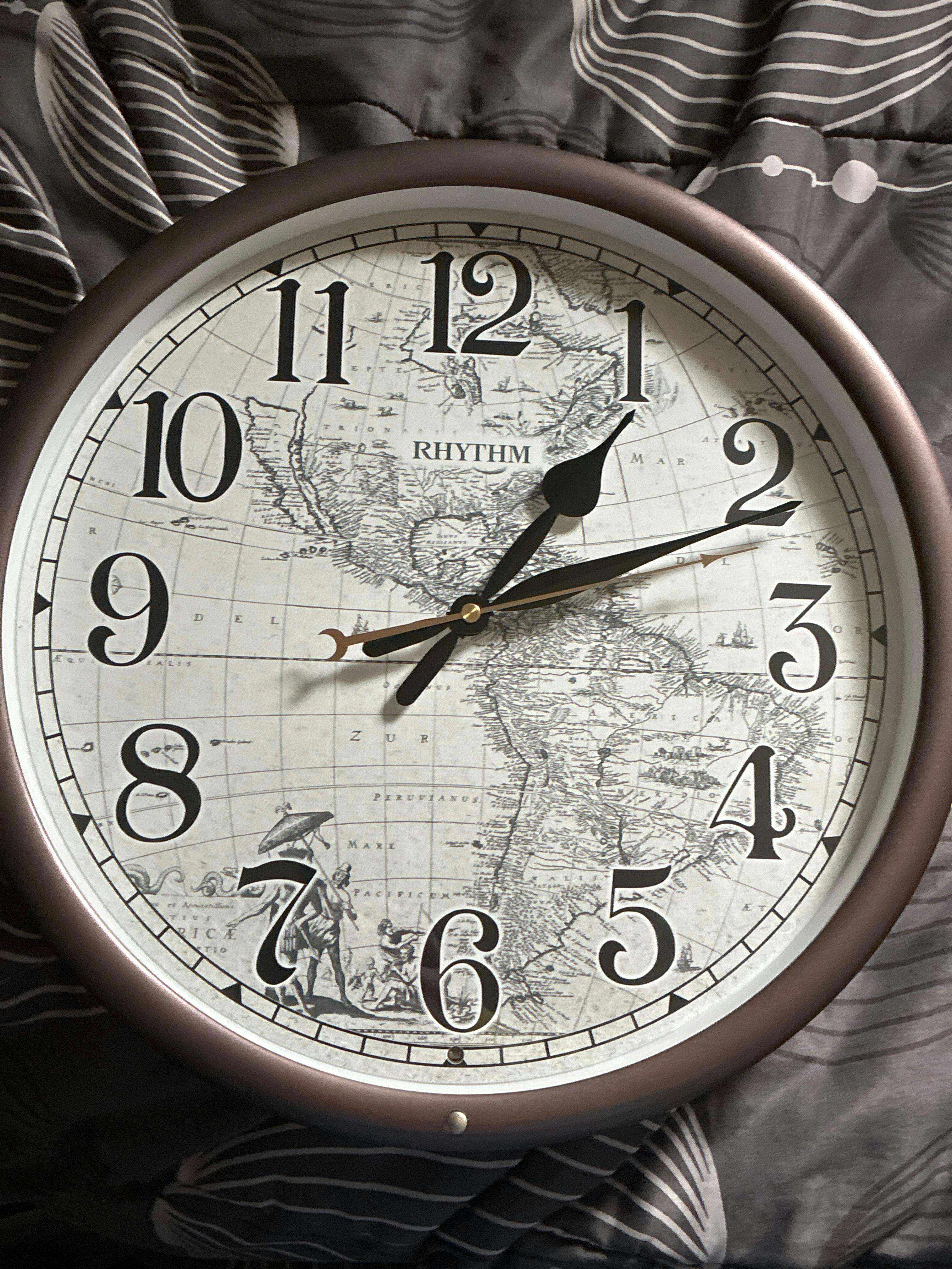 Rhythm 14-Inch Melody “Earth” Decorative Musical Wall Clock