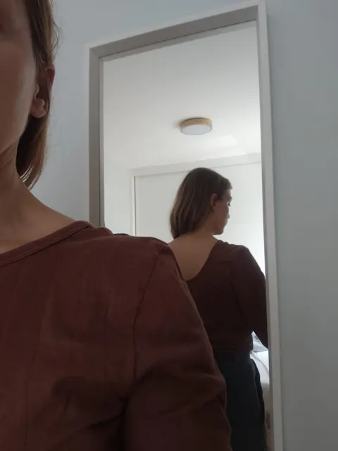 Organic boat neck jersey top in Brown