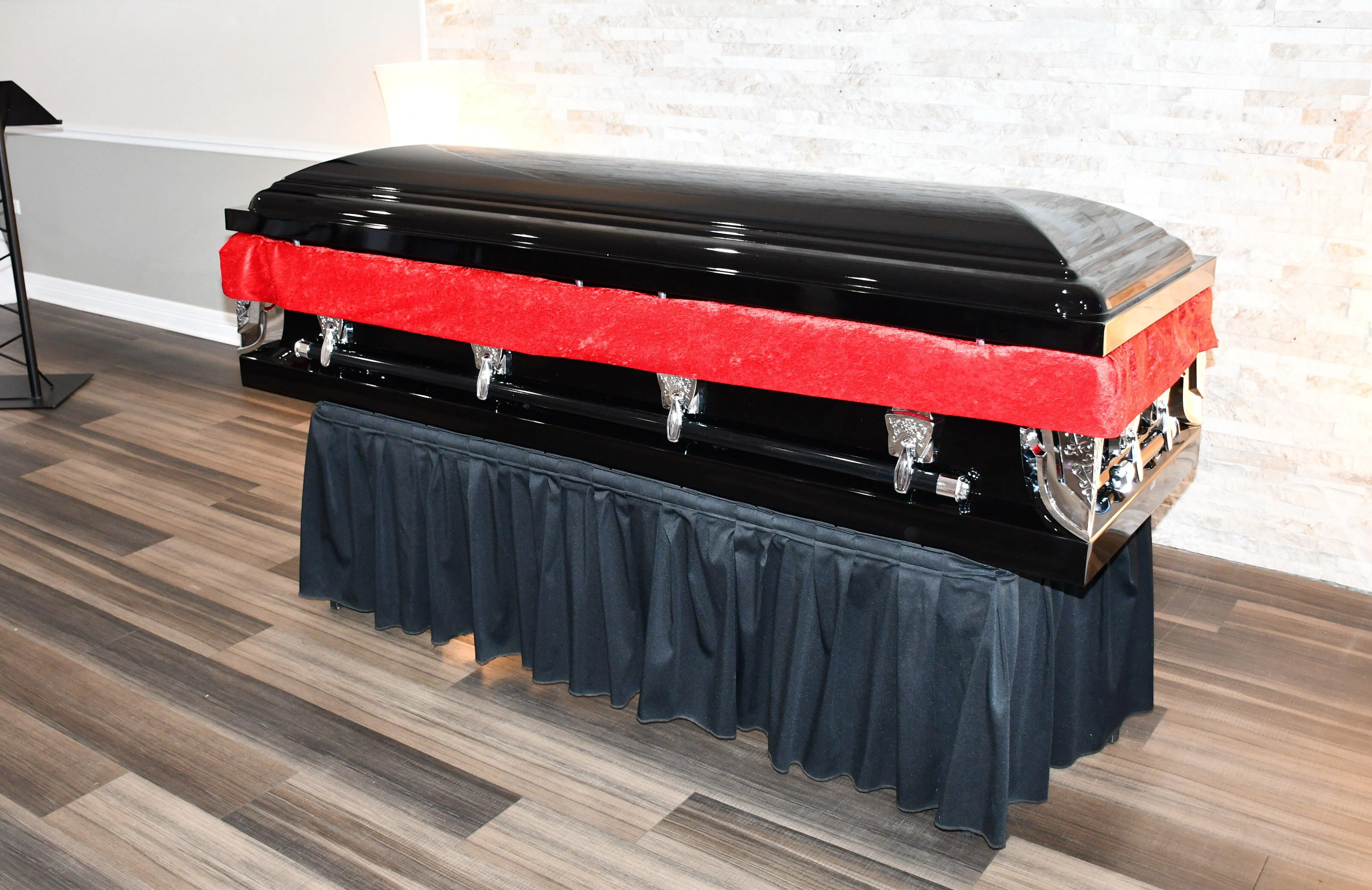 Only $2499 - Titan Cambridge Series Black and Gold Steel Casket