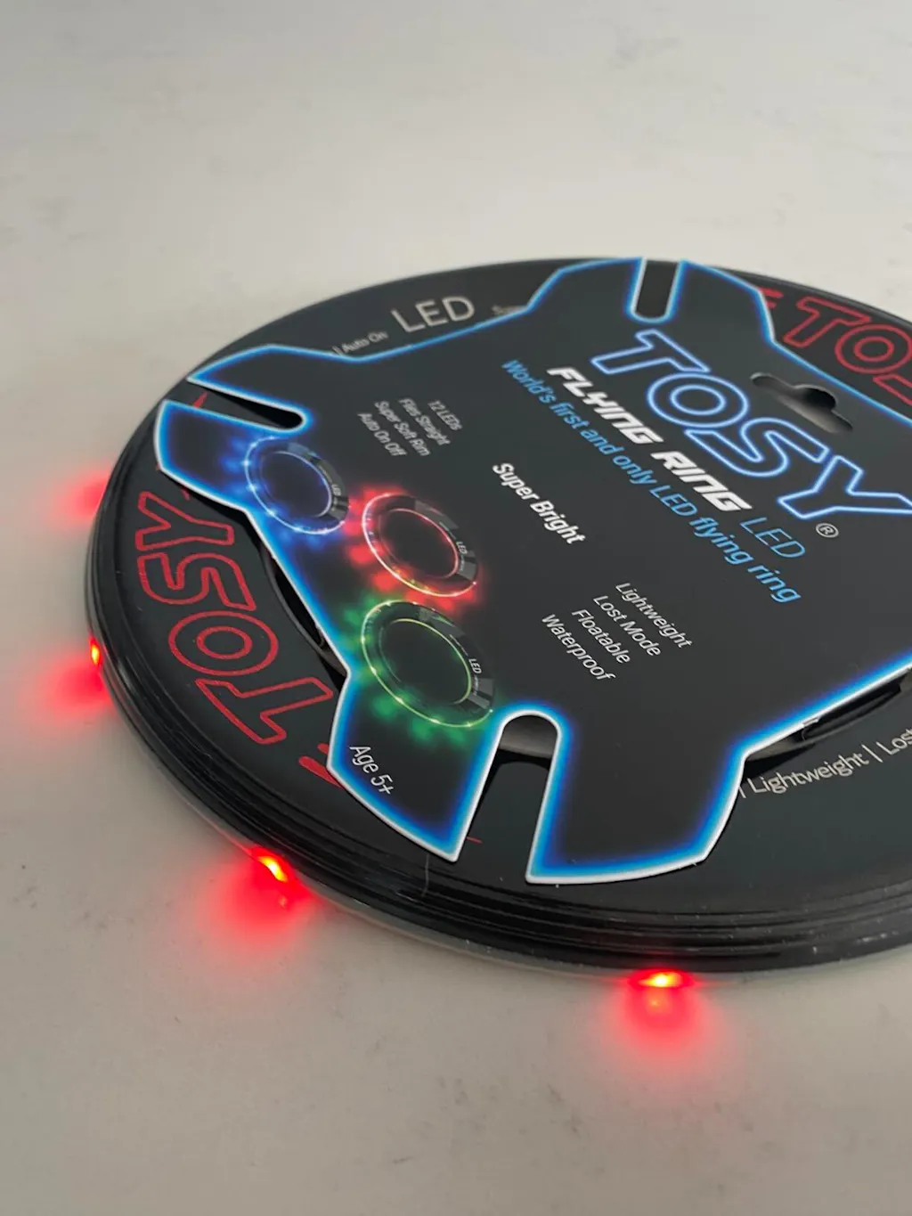 TOSY Flying Ring - 16 Million Colors RGB or 12 LED, Super Bright Lost Mode, Auto Light Up, Safe, Waterproof, Lightweight Frisbee, Birthday and