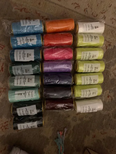 Hilo de poliéster encerado