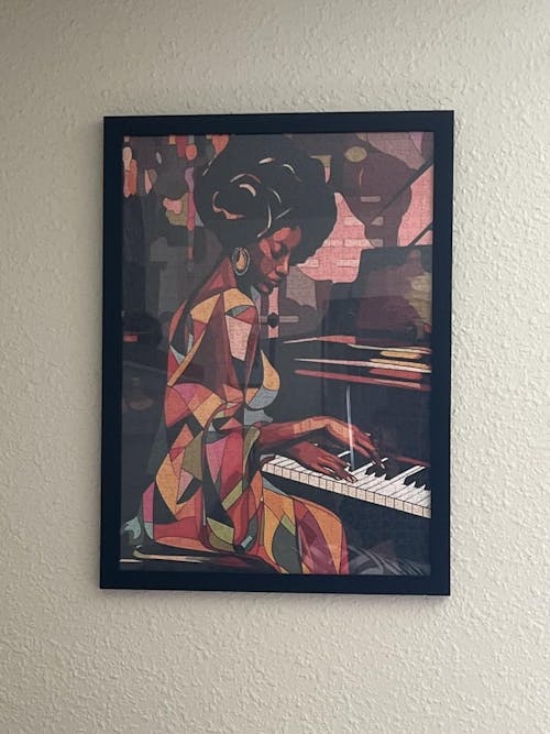 African Women Playing Piano Jigsaw Puzzle