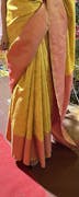 Yellow color silk saree having golden zari print