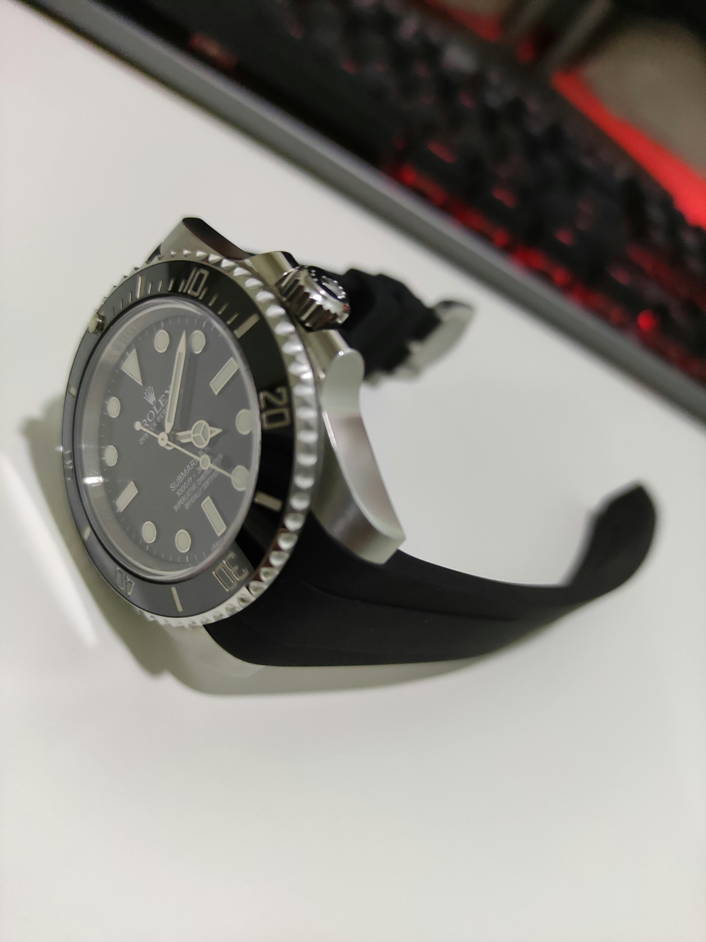 Rolex submariner with sales black rubber strap