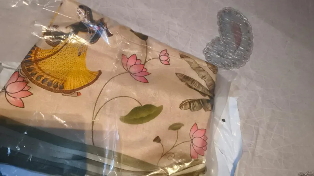 Regal Pichwai Border Semi Tussar Saree