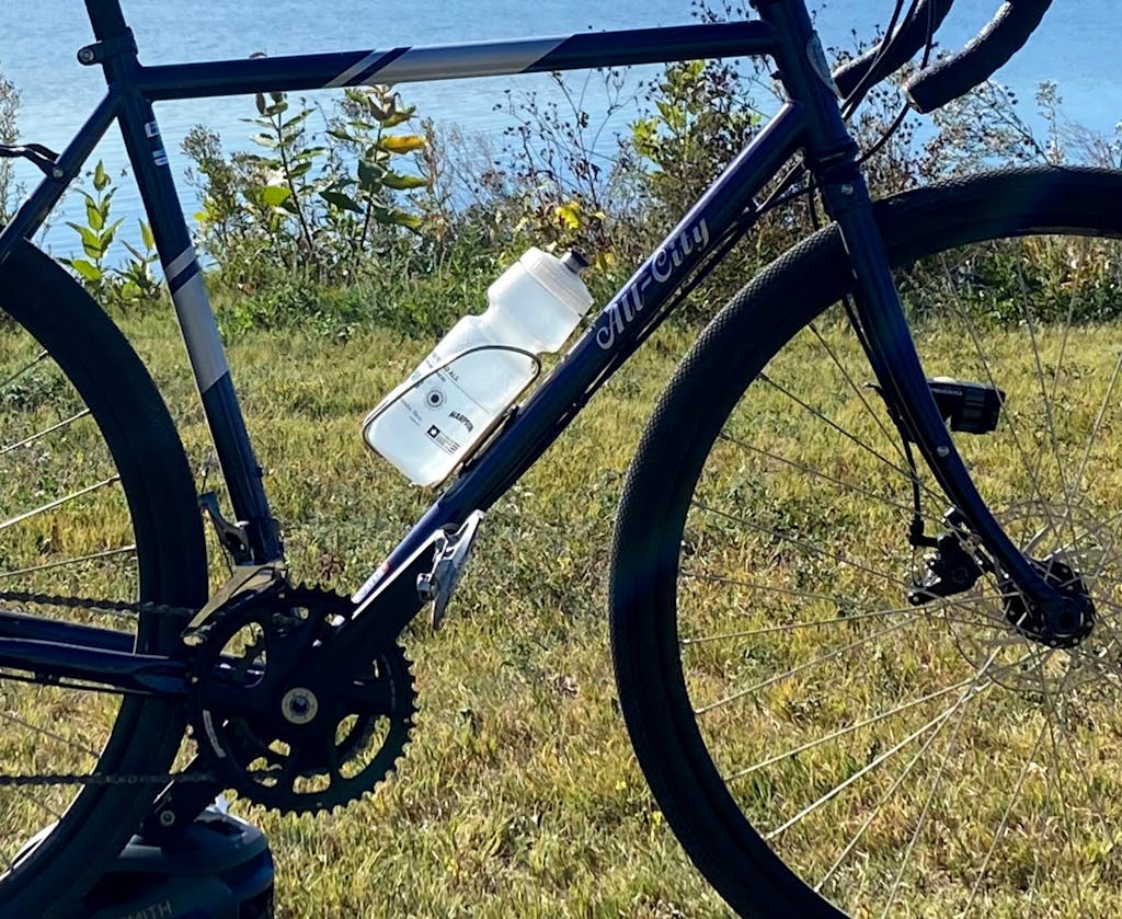 Moderniste Stainless Steel Bottle Cage Velo Orange