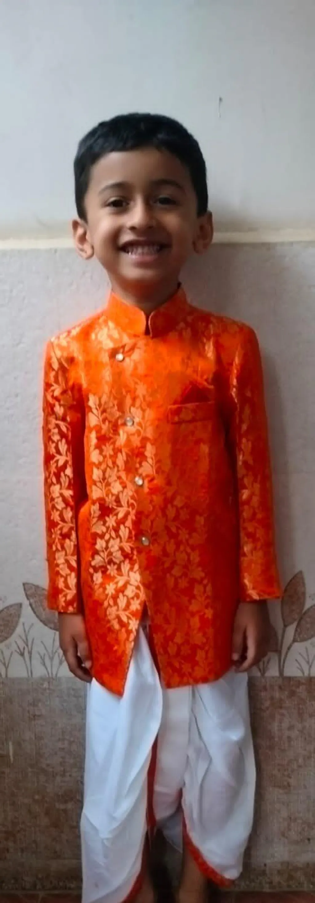Pre Order: Orange Floral Brocade Asymmetric Kurta With Dhoti