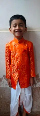 Pre Order: Orange Floral Brocade Asymmetric Kurta With Dhoti