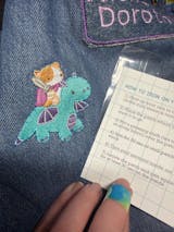 Cat Riding Dragon Embroidered Iron-On Patch