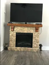 https://woodmajestic.com/products/fieldstone-rustic-electric-fireplace-mantel-package-gds28l8-904st