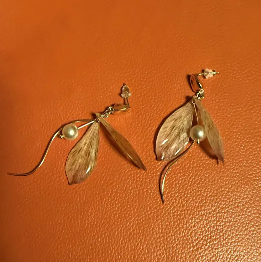 Customer photo showing real preserved flower petals and botanical material