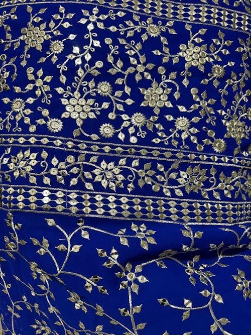 Fancified Blue Sequins Georgette Sangeet Wear Lehenga Choli