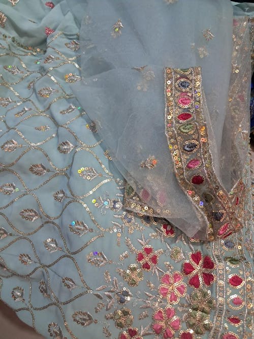 Gorgeous Sky-Blue Sequins Georgette Reception Wear Lehenga Choli