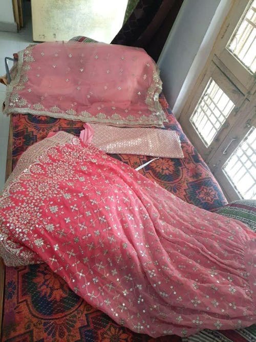 Fabulous Peach Georgette Embroidered Zari Lehenga Choli With Dupatta